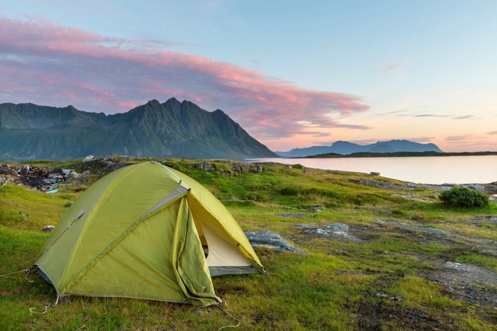 Camp tent by lake