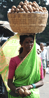 Woman balance load on head