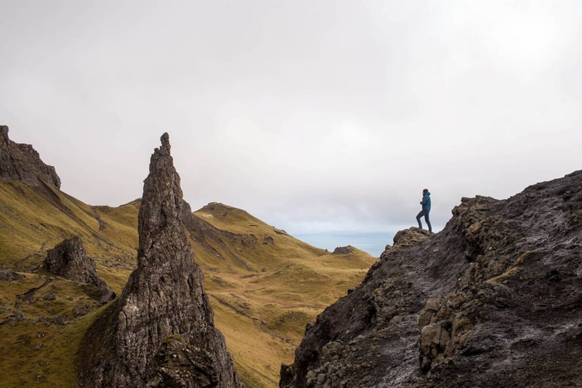 solitary woman on precipice