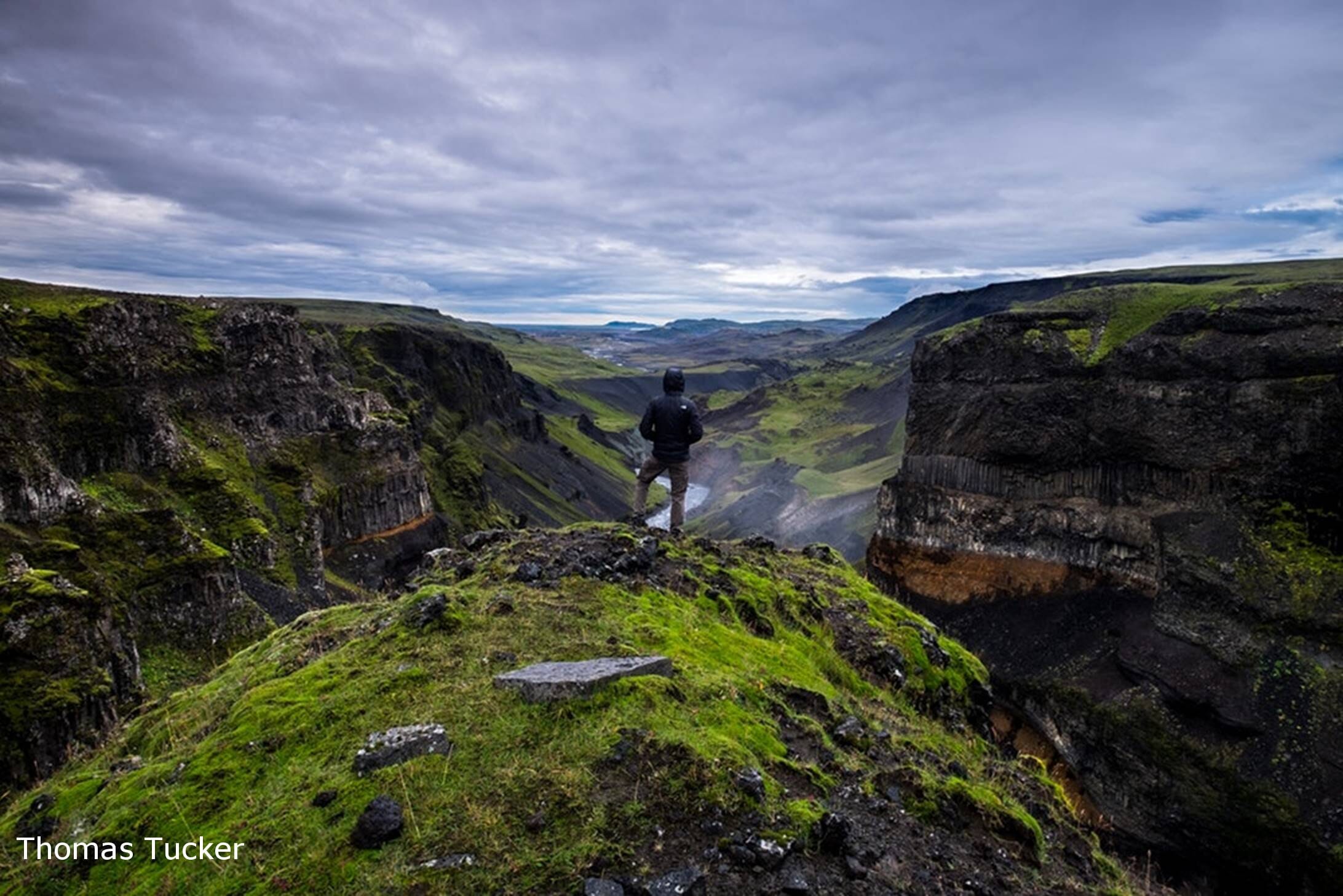 Hiker atop Thai mountain peak